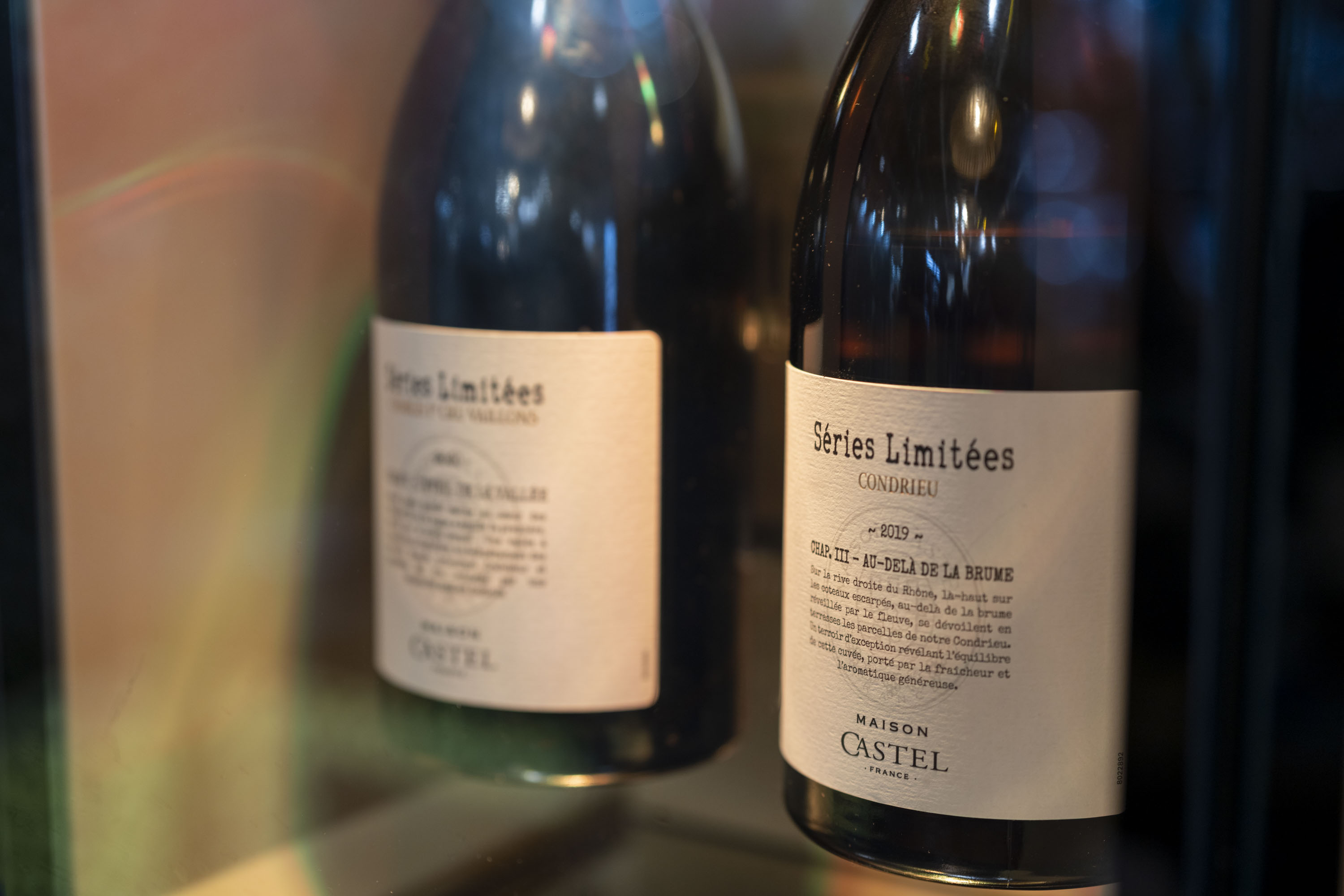 Maison Castel wine bottles