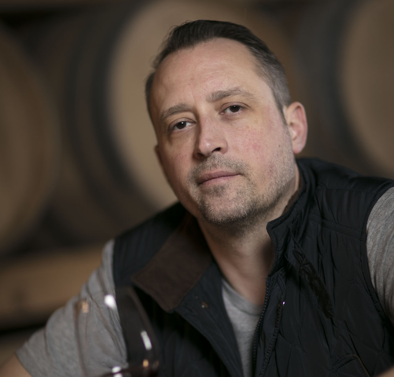Winemaker tasting a glass of wine